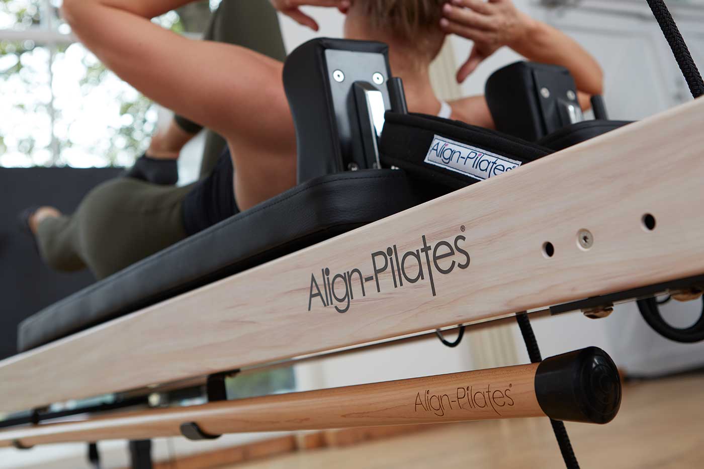 Align-Pilates wood effect reformer closeup