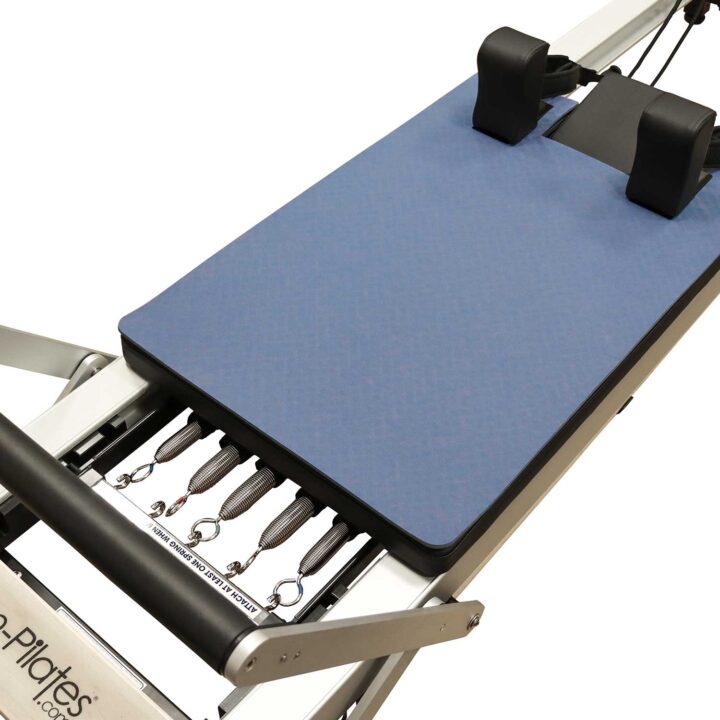Blue/grey carriage protector for Pilates reformer